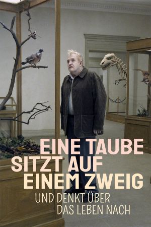 Image Eine Taube sitzt auf einem Zweig und denkt über das Leben nach